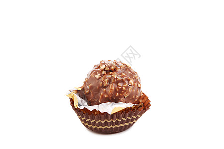 巧克力金蛋和坚果飞碟食物糖果白色糕点松露甜点图片