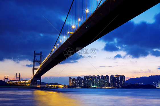 香港长桥 日出时在红东天际晴天场景港口阳光旅游橙子日落海滩海洋图片