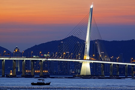 日出过长桥海洋海滩天际场景旅游海岸橙子海岸线港口旅行图片