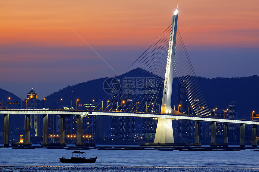 日出过长桥海洋海滩天际场景旅游海岸橙子海岸线港口旅行图片