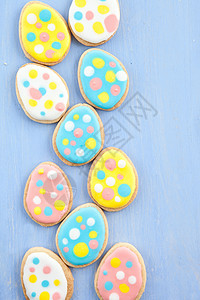 东边有彩色的cokies庆典小雨蓝色饼干装饰框架蛋糕兔子糖果粉色图片