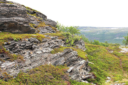 地质岩石层编队巨石侵蚀地面地质学石板矿物悬崖地标苔藓图片