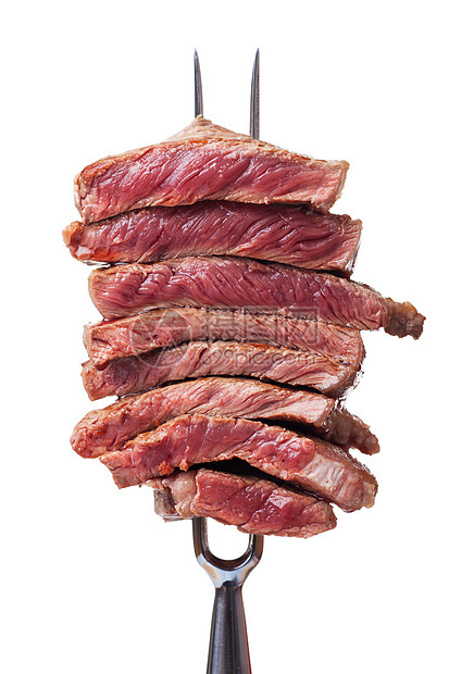 肉叉上的牛排切片烧烤刀具镂空食物银器金属美食家用餐牛肉白色图片