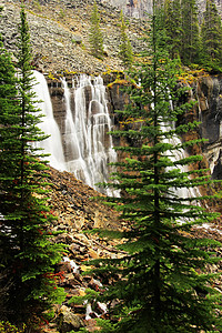 高山瀑布加拿大Yoho国家公园OHara湖七韦利斯瀑布冰川风景树木高山公园国家反射瀑布荒野蓝色背景