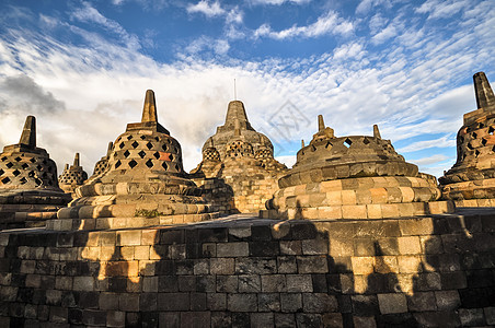 爪哇Yogjakarta的建筑群金字塔旅行仪式纪念碑寺庙神话废墟佛塔日落日出图片