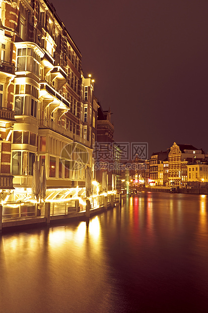 夜间从荷兰阿姆斯特丹到荷兰的城市风景船屋自行车房子建筑学建筑城市运输首都风光历史图片