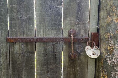 旧的挂锁闩锁房子警卫金属锁孔入口钥匙木头安全图片