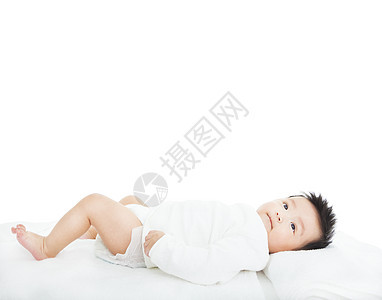 躺在毛巾上可爱的新生儿婴儿图片
