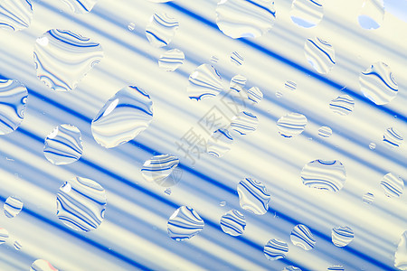蓝色带水滴的抽象背景艺术珠子雨滴玻璃气泡飞沫液体宏观图片
