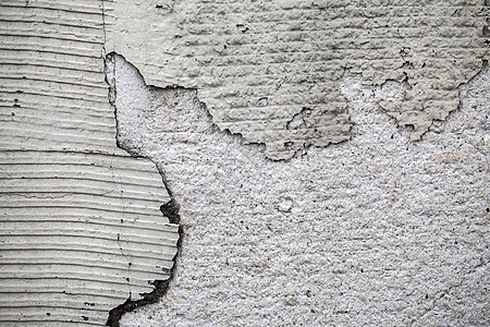 Grunge 碎裂的墙壁背景地面裂缝建筑墙纸建筑学材料房子粮食石膏水泥图片