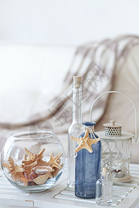 夏季内装饰房间纪念品桌子旅行乡村风格瓶子静物假期海星图片
