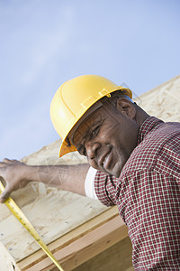 建筑施工工人测量大楼建设验船师结构技术建筑工人倾斜职业视图安全安全帽建设者图片