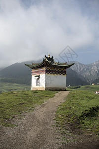 藏藏建筑地球佛教徒女士宗教高地场景草地阳光草原房子图片