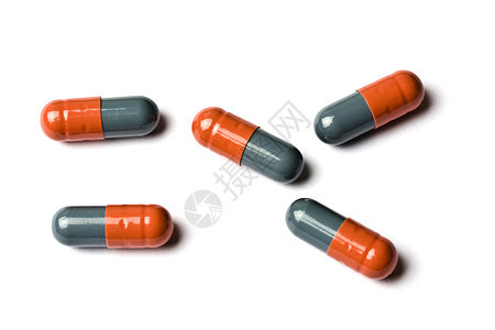 白色背景上分离的胶囊药剂师医疗药片概念疾病疼痛药品橙子化学药店图片