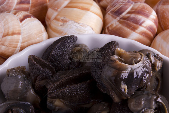 氯化咖啡饼烹饪树干食物大蒜美食健康午餐蜗牛盘子田螺图片
