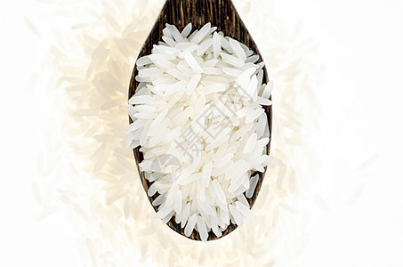 白背景的木勺米稻谷勺子摄影农业香米食物静物饮食厨房干货素食图片