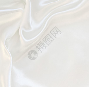 作为婚礼背景的平滑优雅白色丝绸布料投标材料银色织物纺织品涟漪曲线新娘折痕图片