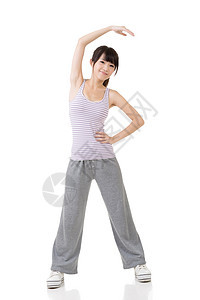 适合亚洲女孩闲暇运动火车微笑身体运动装白色姿势女性健身房图片