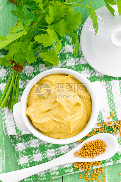 芥末肉汁粮食香料小吃盘子勺子桌子美食厨房奶油图片