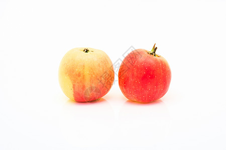 孤立的小红苹果和黄苹果尺码白色食物红色黄色水果背景图片