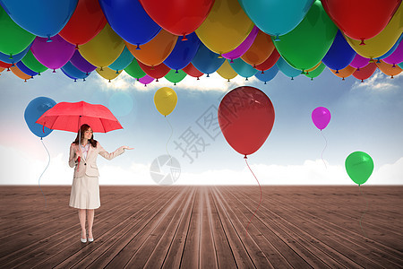 持有红伞的有吸引力的女商务人士的综合形象绘图公司天空套装商业气球计算机红色庇护所头发图片