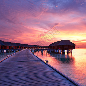 马尔代夫海滩日落海景酒店房子日出蓝色奢华天空海洋阳光假期图片