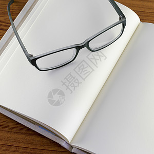 笔记本上的眼镜备忘录软垫日记活页宏观办公室笔记纸工作教育学校图片