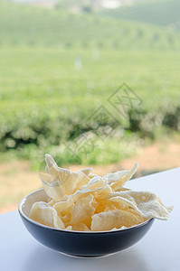 稻米芯片美食饼干食物油炸盘子绿色小吃白色图片