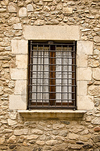 有窗口的旧墙酒吧住房分支机构石头玻璃建筑学窗户背景图片