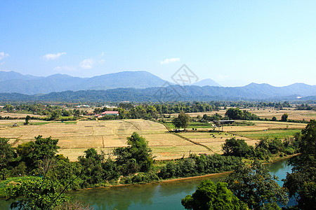 由老挝范维昂的宋河环绕假期热带文化村庄旅游旅行森林乡村场景绿色图片