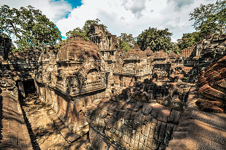 Angkor Wat综合体暹粒区古老的佛教赫默寺庙高棉语木头废墟佛教徒蓝色文化考古学宗教天空石头图片