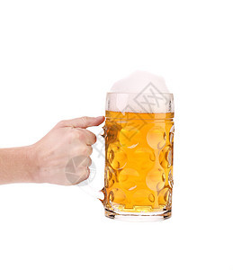 手拿着大杯的金啤酒酒吧液体流动庆典派对泡沫金子饮料文化酒精图片