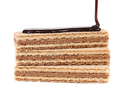 巧克力一块木桩饼小吃食物蛋糕奶油瓦楞坚果赌注面粉早餐晶圆图片