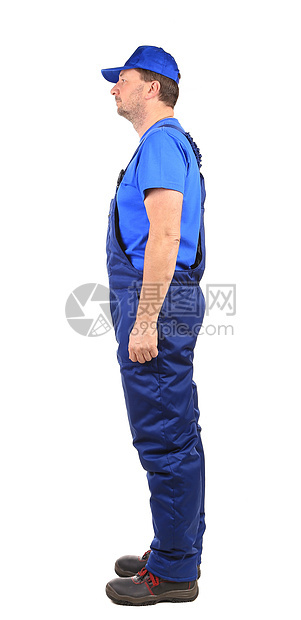 穿蓝制服的工人 侧面风景机械身体靴子蓝色管道帽子工作白色腰部建筑图片