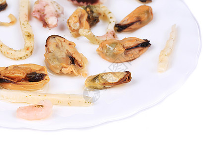 盘子里有美味的海鲜触手牡蛎营养海洋饮食宏观贝类美食蓝色午餐图片