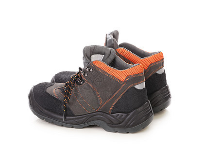 黑色和橙色男人靴子对齐衣服崎岖安全男性跑步活动鞋类运动鞋带橡皮图片