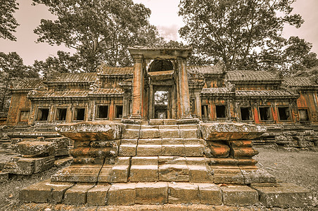 柬埔寨暹粒的和Angkor Wat高棉建筑群微笑蓝色天空石头建筑学旅游旅行雕塑废墟高棉语图片