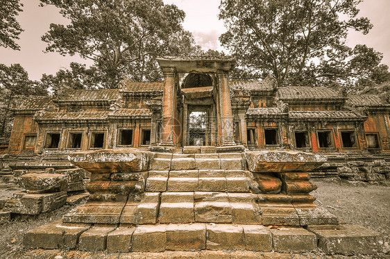 柬埔寨暹粒的和Angkor Wat高棉建筑群微笑蓝色天空石头建筑学旅游旅行雕塑废墟高棉语图片