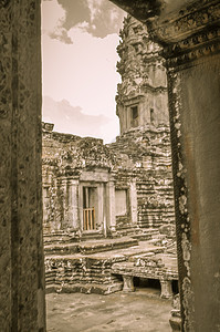 柬埔寨暹粒的和Angkor Wat高棉建筑群高棉语眼睛雕像收获废墟寺庙纪念碑蓝色旅游上帝图片