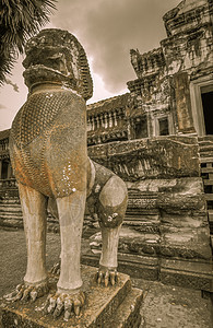 柬埔寨暹粒的和Angkor Wat高棉建筑群石头雕像宗教艺术上帝建筑学天空文化高棉语佛教徒图片