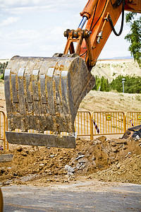 在康斯特省工作 在Entehoving卸沙时卸沙的轮式搬运机刀刃建筑天空地面土壤车辆装载机挖掘拖拉机矿业图片