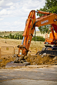 建筑工地 带有挖掘设备的挖掘设备机器装载机车辆反铲沙坑土壤运动地面机械矿业图片