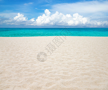 沙滩和热带海太阳晴天放松海景天堂冲浪蓝色天空阳光海浪图片