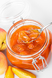 美味的桃果酱食品小吃宏观勺子餐巾用具早餐食物桃子水果图片
