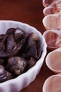 氯化咖啡饼大蒜田螺烹饪午餐香菜饮食食物蜗牛健康棕色图片
