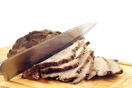 木板上的烤猪肉午餐火腿食物烧烤釉面红色烹饪牛肉美食盘子图片