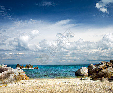 热带海洋旅行场景蓝色太阳波纹天空假期海景阳光风景图片