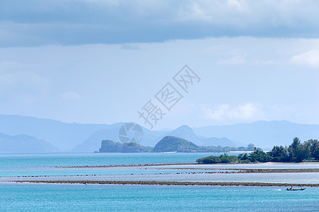 热带海洋日落场景波纹天空蓝色旅行阳光棕榈太阳海景图片