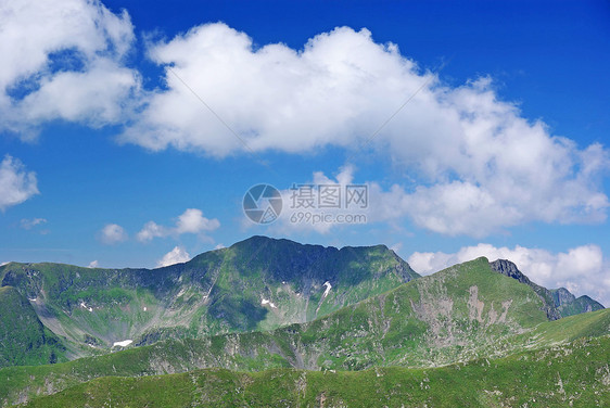 山峰顶峰冒险旅行蓝色山脉孤独旅游侵蚀高度地标图片