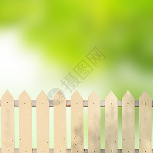 带绿叶的白栅栏房子安全木头公园后院场地蓝色花园财产树篱图片
